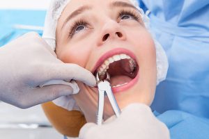 Tooth extraction and implant